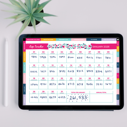 Digital steps tracker pages on a tablet with a plant in the background