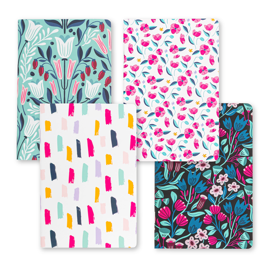 A set of 4 mini notebooks — the Teal Tulips, Confetti, Pink Poppies, and Dark Floral editions — on a white bckground.