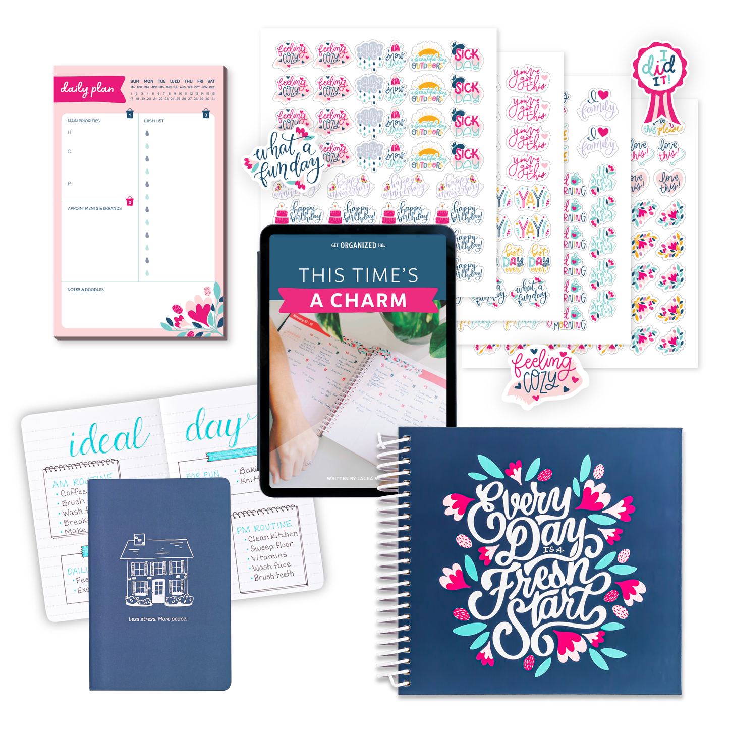 The navy planer, a navy mini notebook that says "Less stress. More peace.", a tablet with the digital This Time's a Charm Guide on it, a daily planning notepad, and the decorative sticker pack.