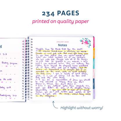 Open spiral-bound planner with colorful notes on quality paper, text indicating 234 pages.