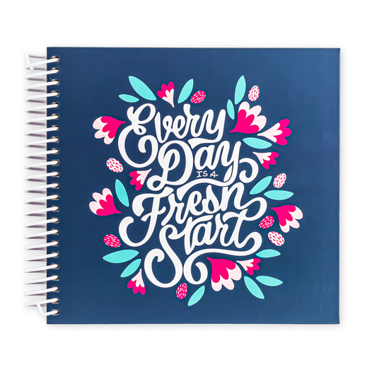 Navy planner with 'Every Day is a Fresh Start' design on a white background
