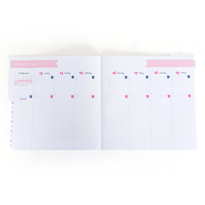 Two pages of the planner booklet showing a month's schedule on a white background