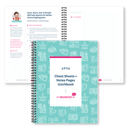 A spiral-bound workbook titled '2026 Cheat Sheets + Notes Pages Workbook' shown in front of an open notebook spread. The cover is light aqua with white line drawings pink accents, and the open pages are white with navy text and small pink highlights.