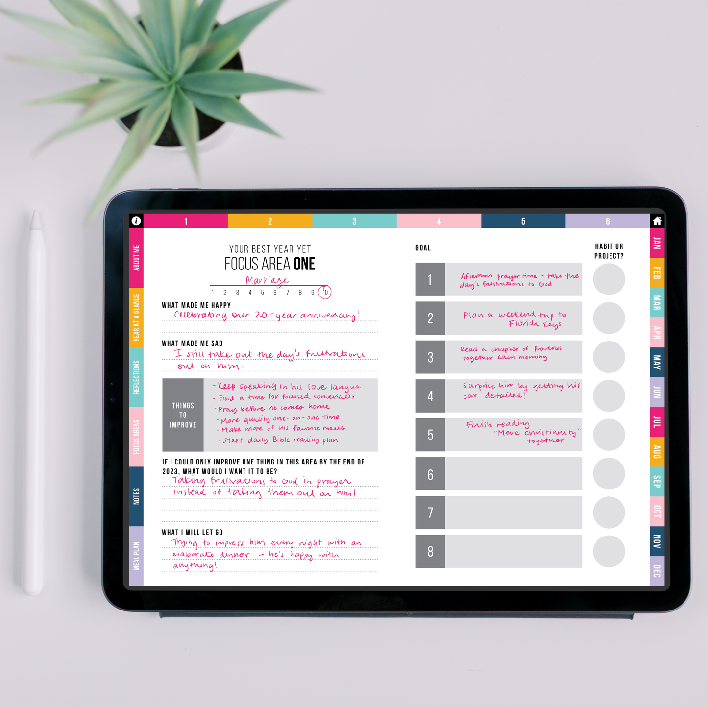 Focus Area page on a tablet with a plant in the background
